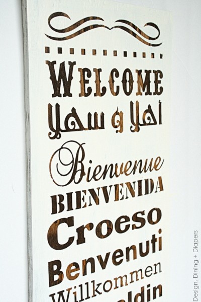 Multilingual Wood Welcome Sign