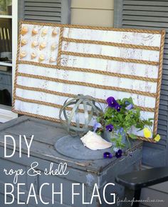 Bring a little bit of the beach right to your front porch or home.  DIY Rope and Shell Beach Flag from FindingHomeOnline.com tutorial at TidyMom.net